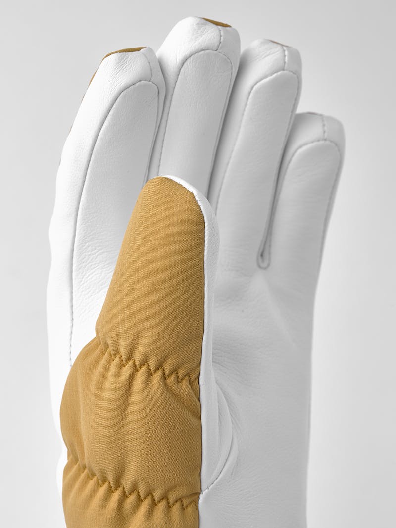 Dark yellow ski glove with white hairsheep palm
 (2 of 8)