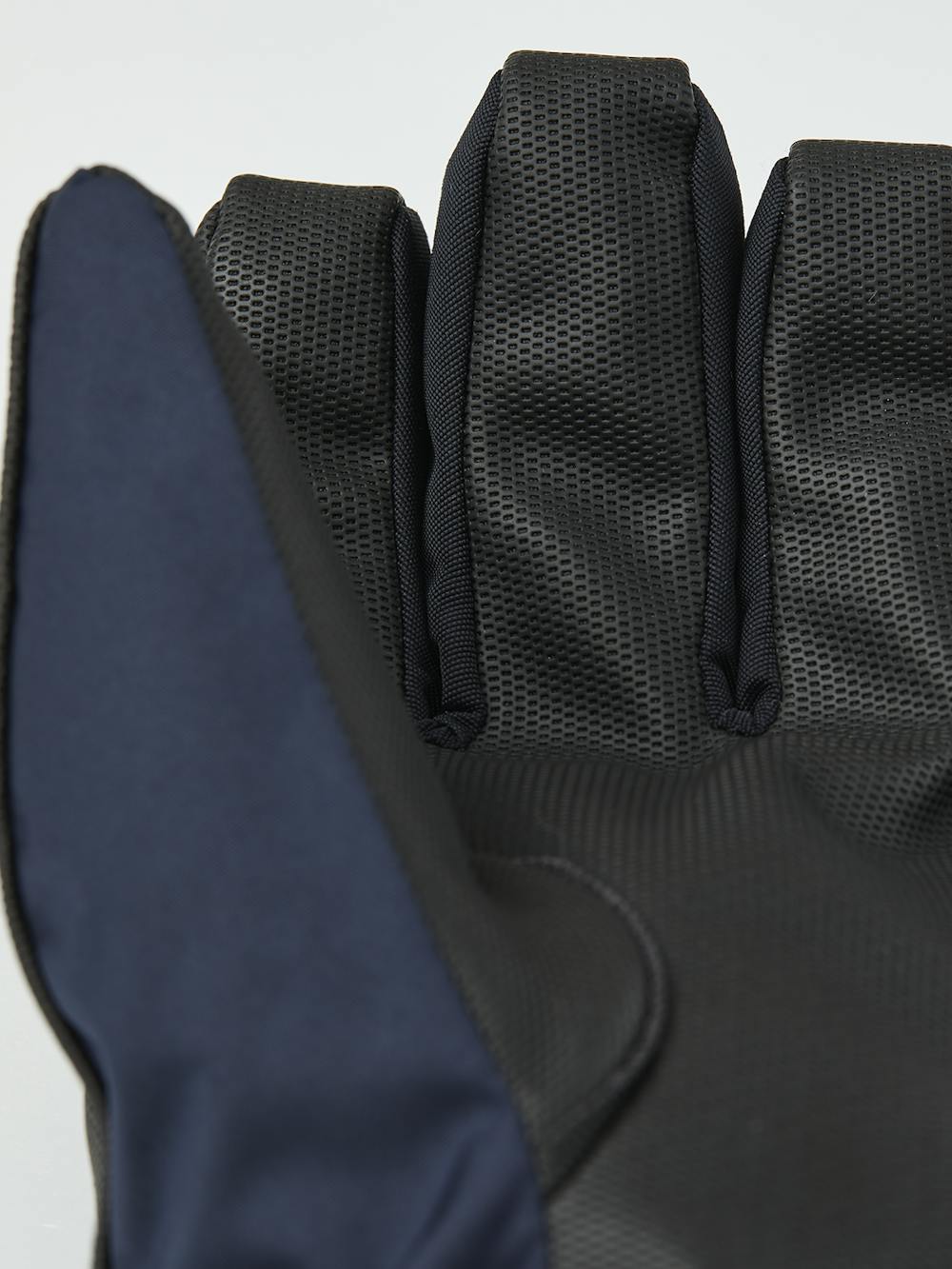 Dunkelblauer Kinderhandschuh aus Stoff mit schwarzer Innenhand aus Synthetikmaterial und verstellbarem Handgelenkverschluss (4 oder 5)