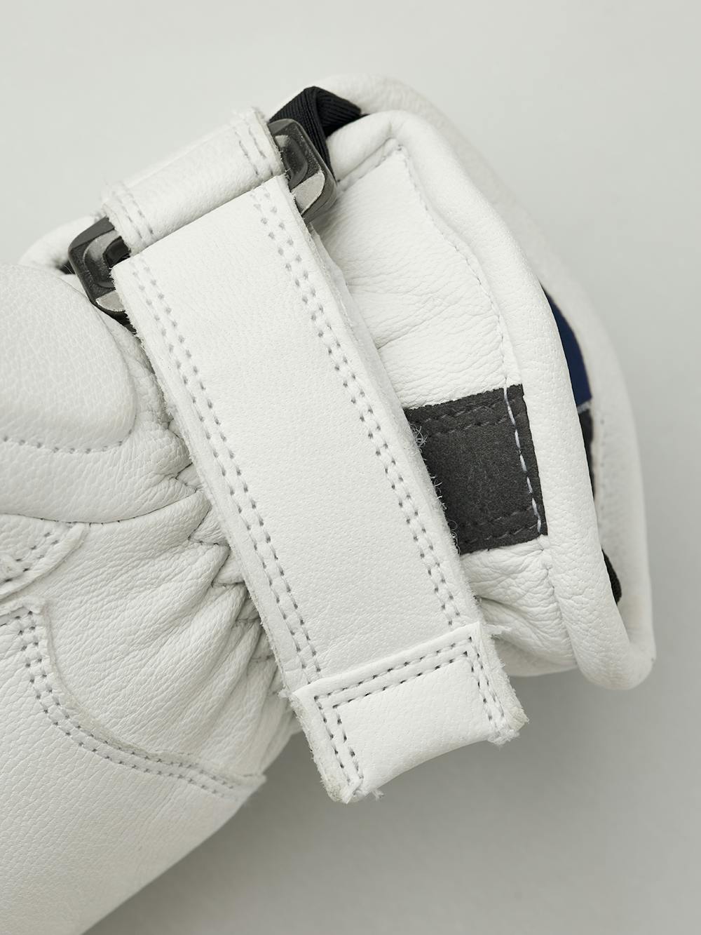 White ski glove with gray and pink goat leather details and synthetic suede palm (3 of 4)