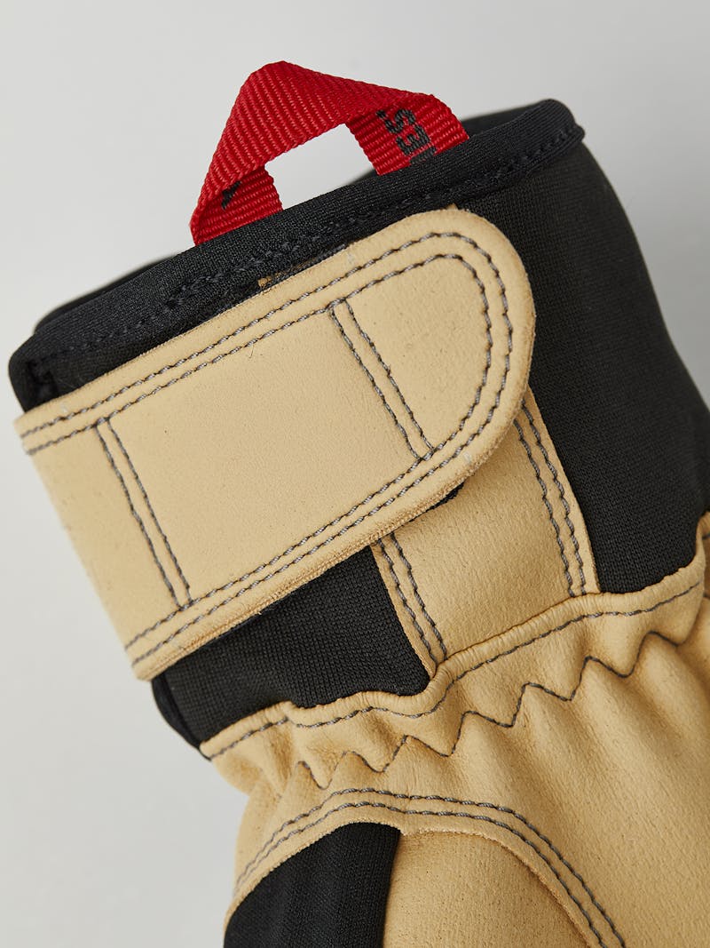 Black fabric outdoor glove with light brown synthetic suede palm and wrist adjustment (2 of 5)