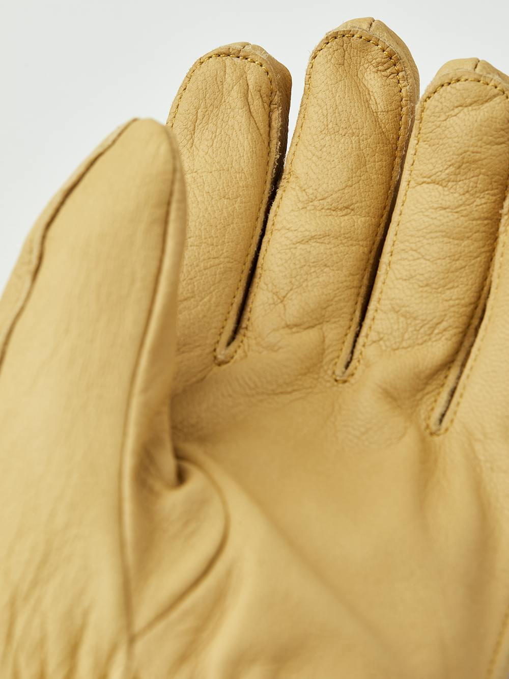 Gul friluftshandske i getskinn
(5 av 7)