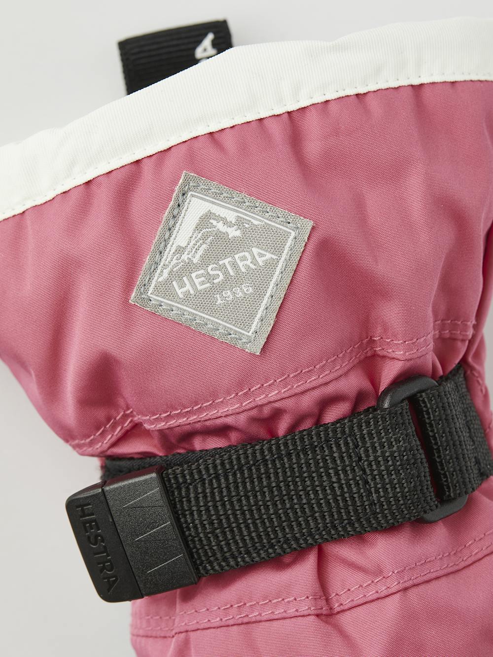 Pink children’s glove with black synthetic palm and wrist adjustment (3 of 6)