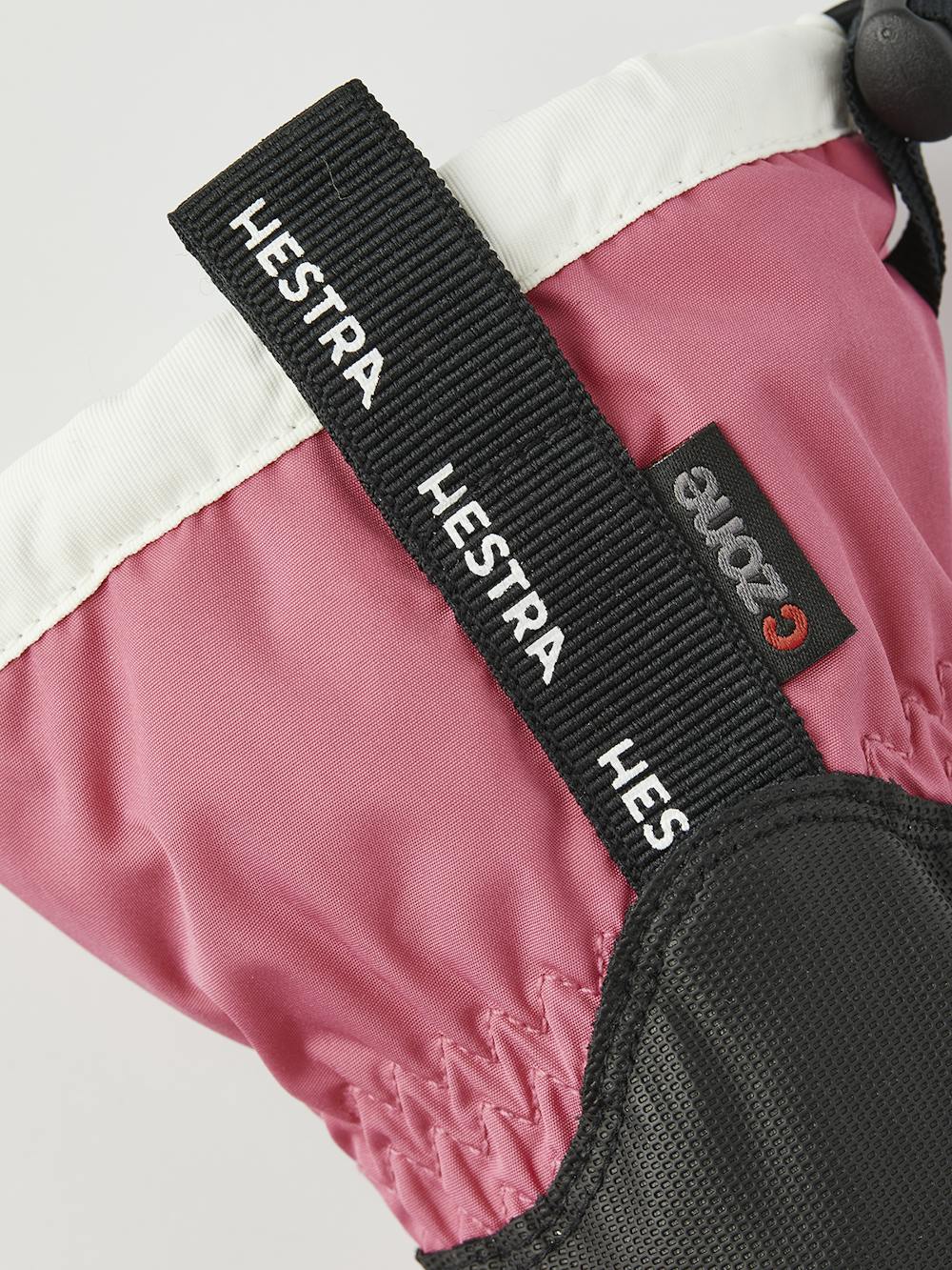 Pink children’s glove with black synthetic palm and wrist adjustment (2 of 6)