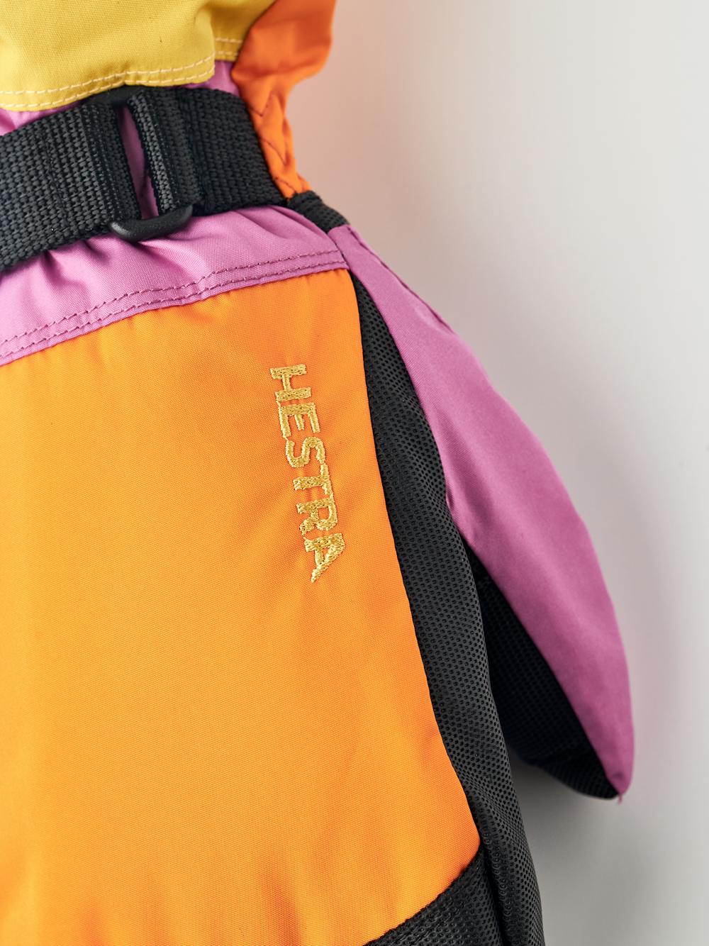 Orange-rosa Fausthandschuh mit schwarzem Synthetikmaterial an der Innenhand und verstellbarem Handgelenkverschluss  (4 oder 6)