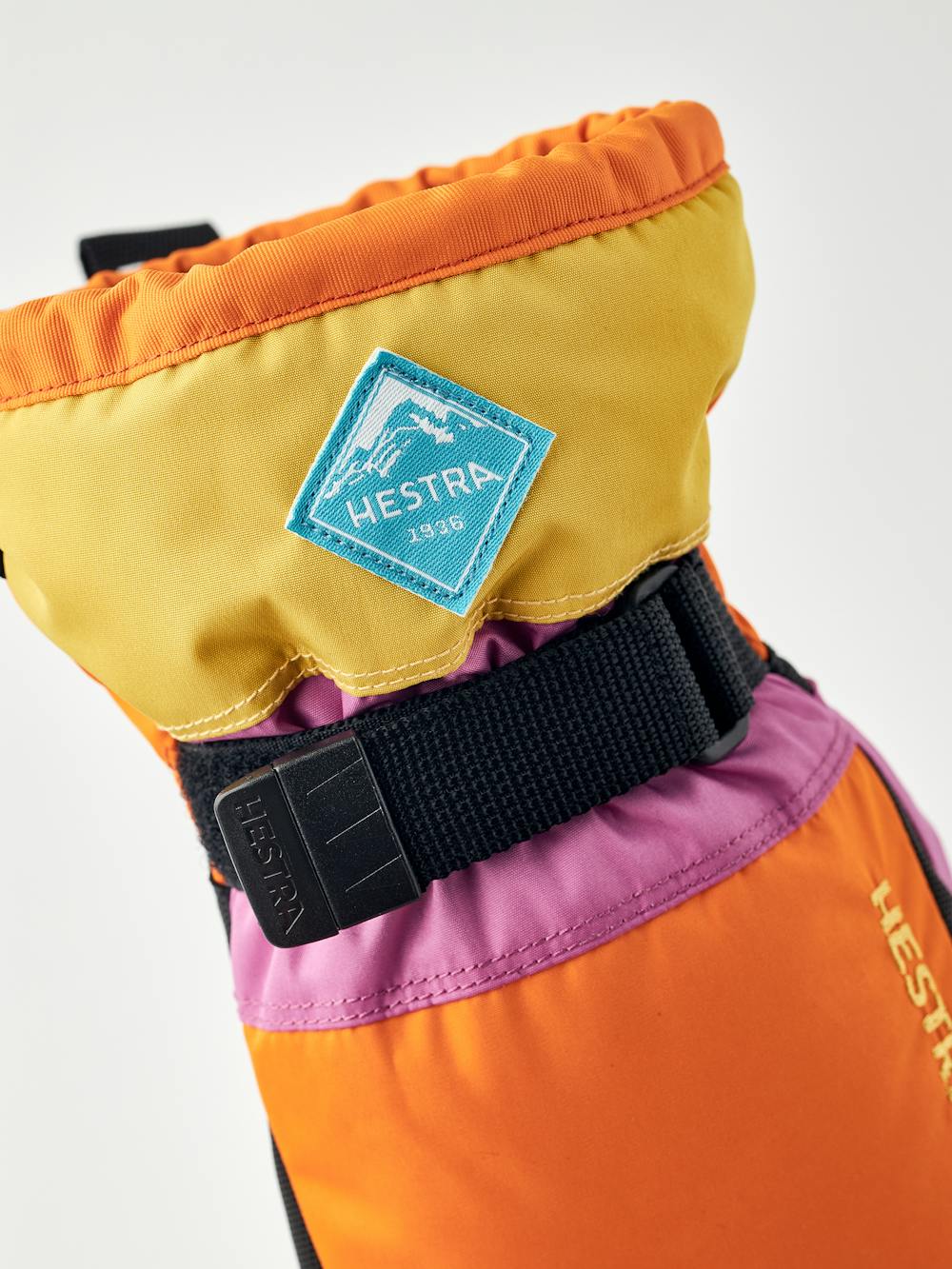 Orange-rosa Fausthandschuh mit schwarzem Synthetikmaterial an der Innenhand und verstellbarem Handgelenkverschluss  (2 oder 6)