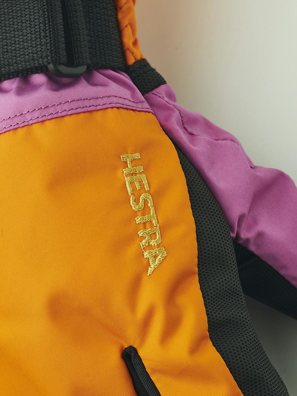 Orange and pink three finger glove with black synthetic palm and wrist adjustment (5 of 6)