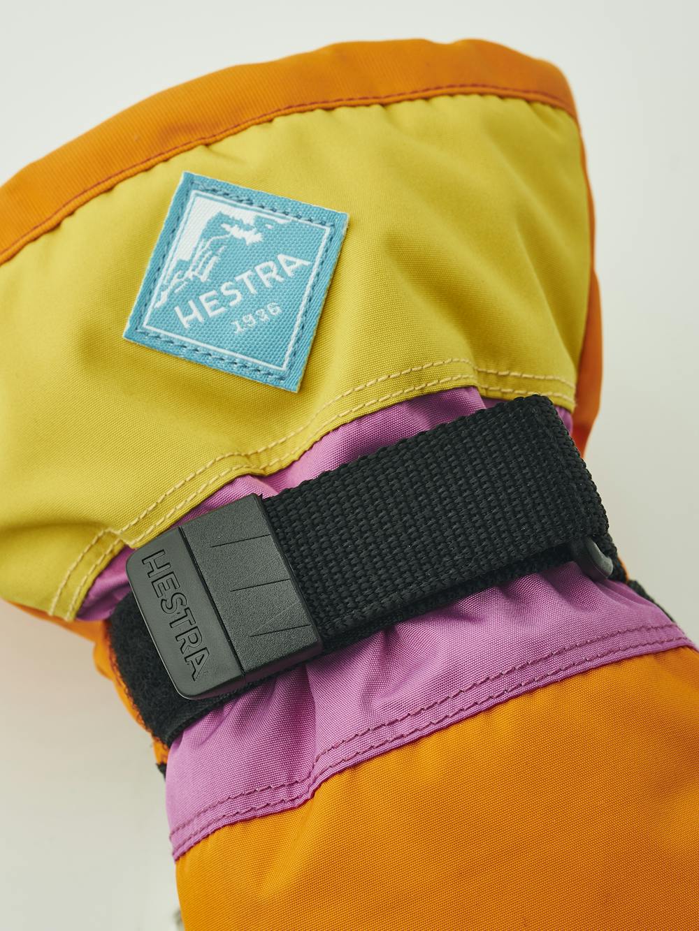 Orange and pink three finger glove with black synthetic palm and wrist adjustment (4 of 6)