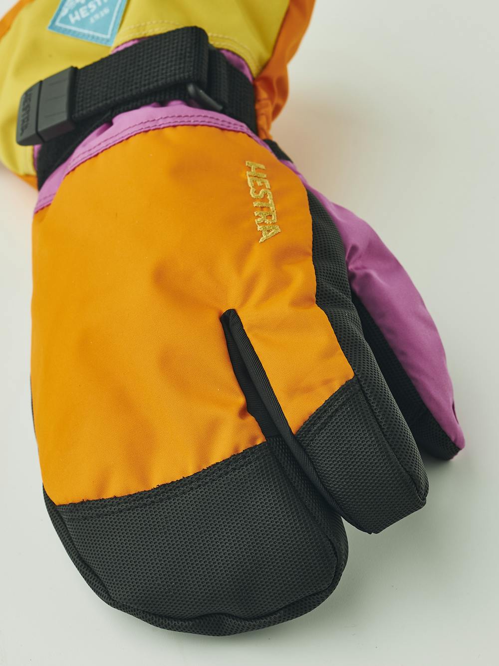 Orange and pink three finger glove with black synthetic palm and wrist adjustment (2 of 6)