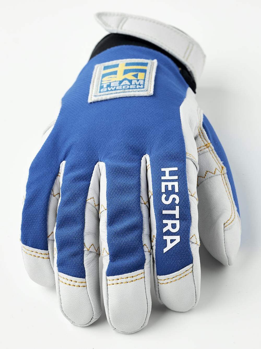 Blå friluftshandske med vitt getskinn i innerhanden
(4 av 5)