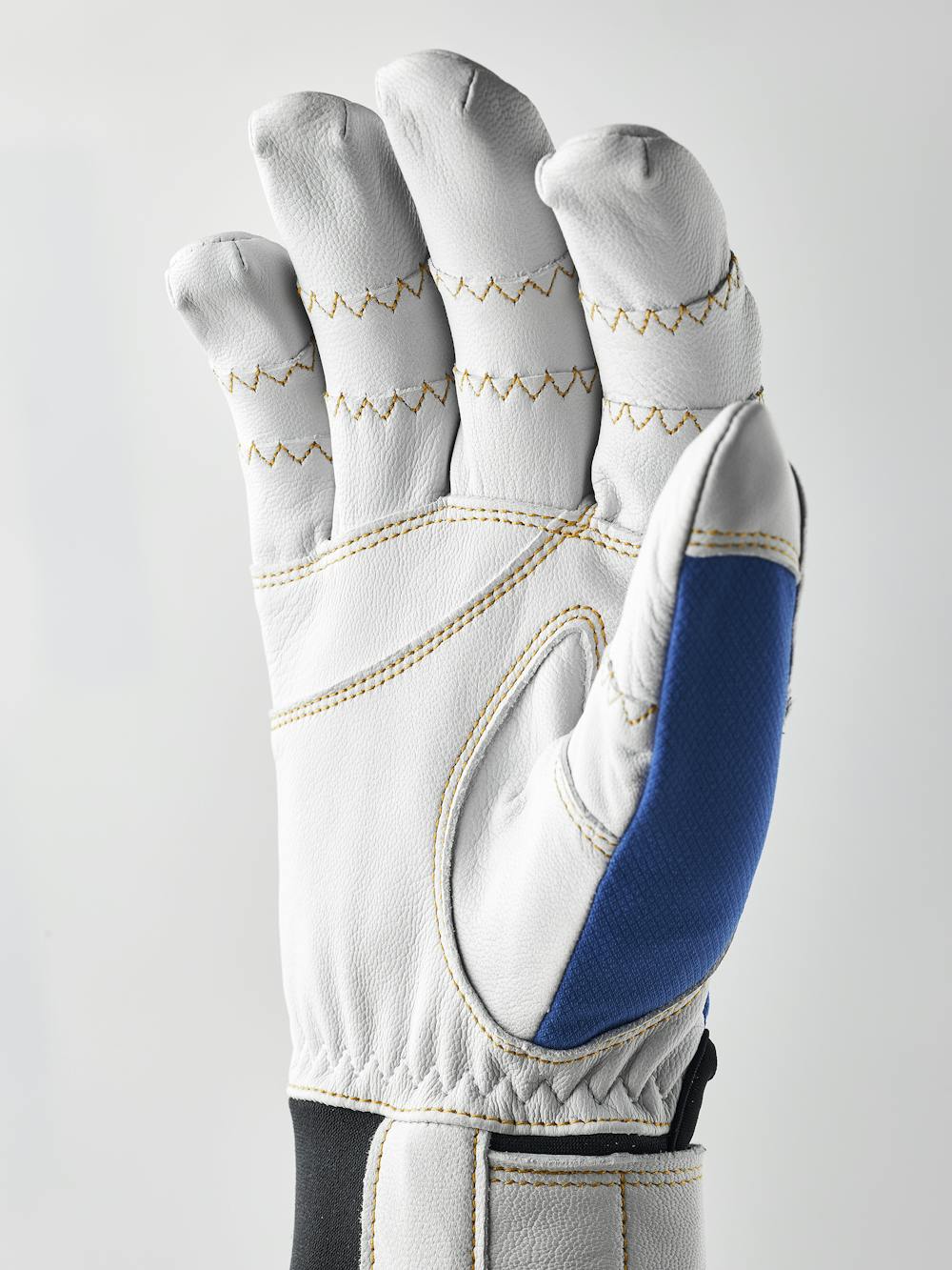 Blå friluftshandske med vitt getskinn i innerhanden
(2 av 5)