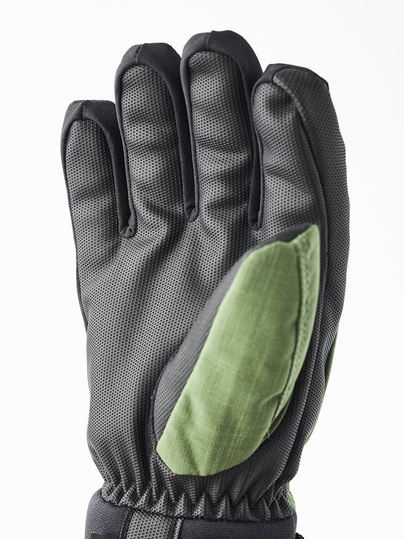 Green fabric children’s glove with black palm  (6 of 7)