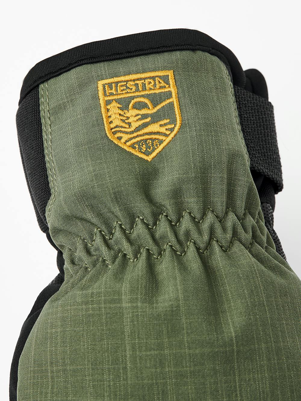 Green fabric children’s glove with black palm (2 of 7)