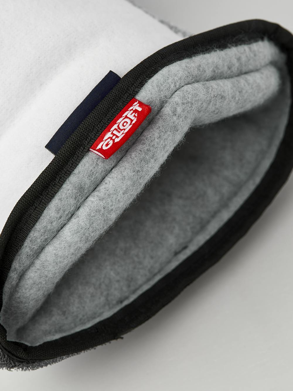 Vitt maskinsytt tumfoder
 (2 av 4)