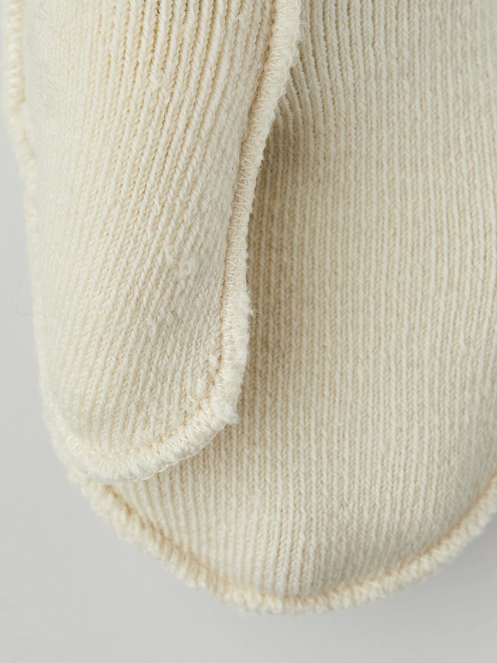 Weißer maschinengenähter Innenfäustling (4 oder 4)