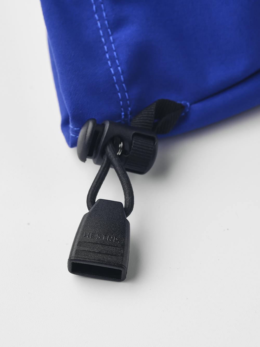 Blue shell glove with black fabric palm and wrist adjustment (3 of 3)