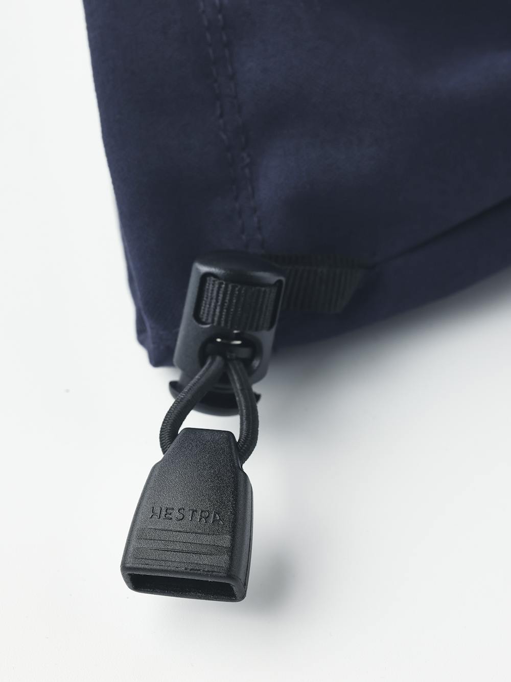 Dark blue shell glove with black fabric palm and wrist adjustment (5 of 5)