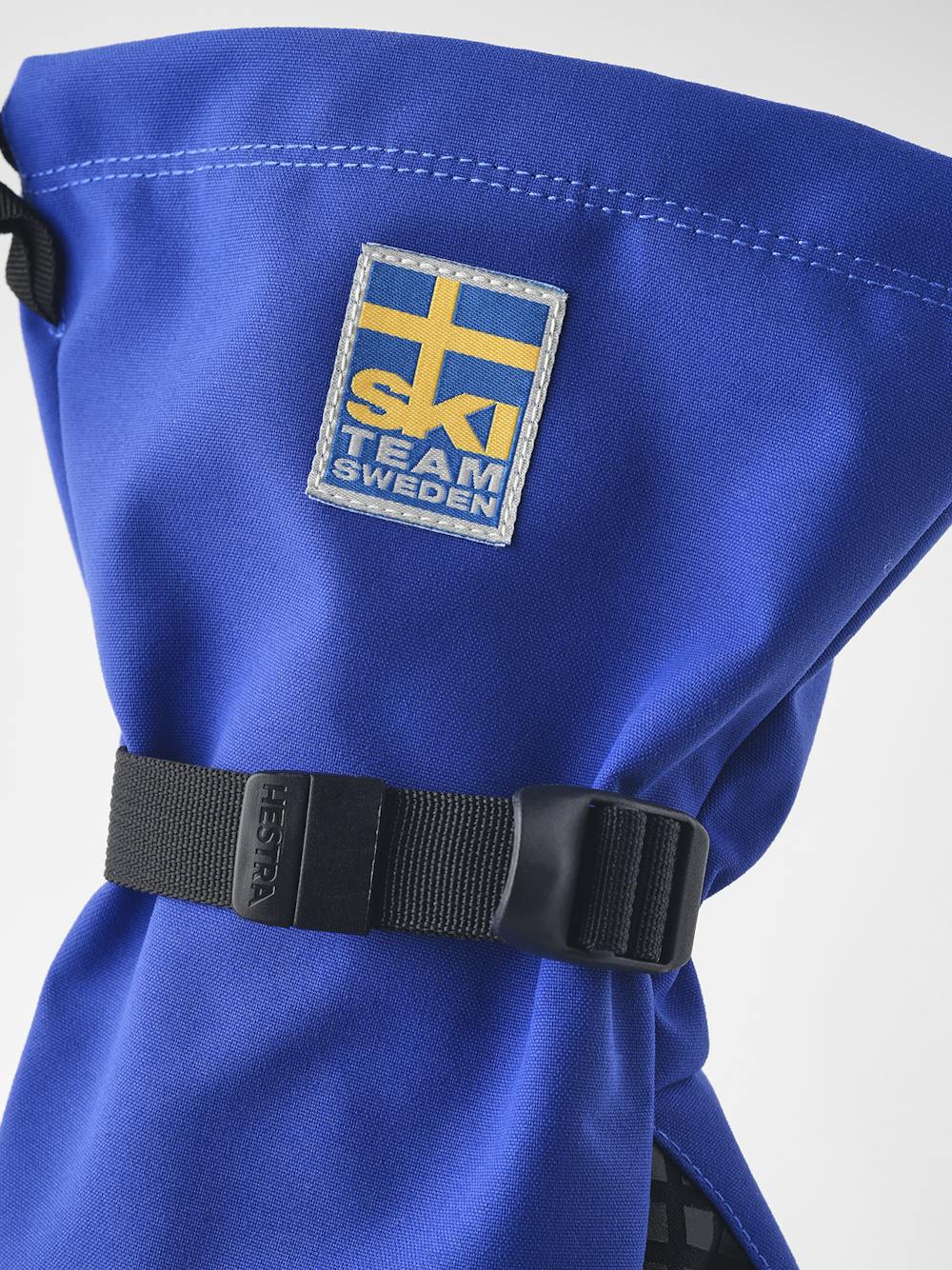 Blue shell glove with black fabric palm and wrist adjustment (2 of 3)