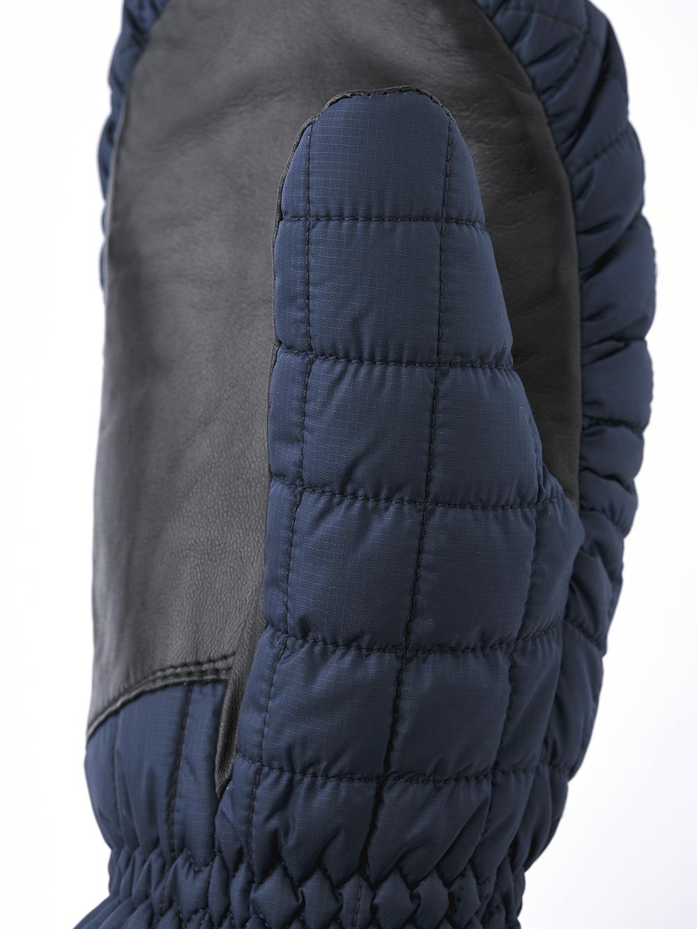 Dunkelblauer Fausthandschuh mit schwarzem Haarschafleder an der Innenhand (4 oder 6)