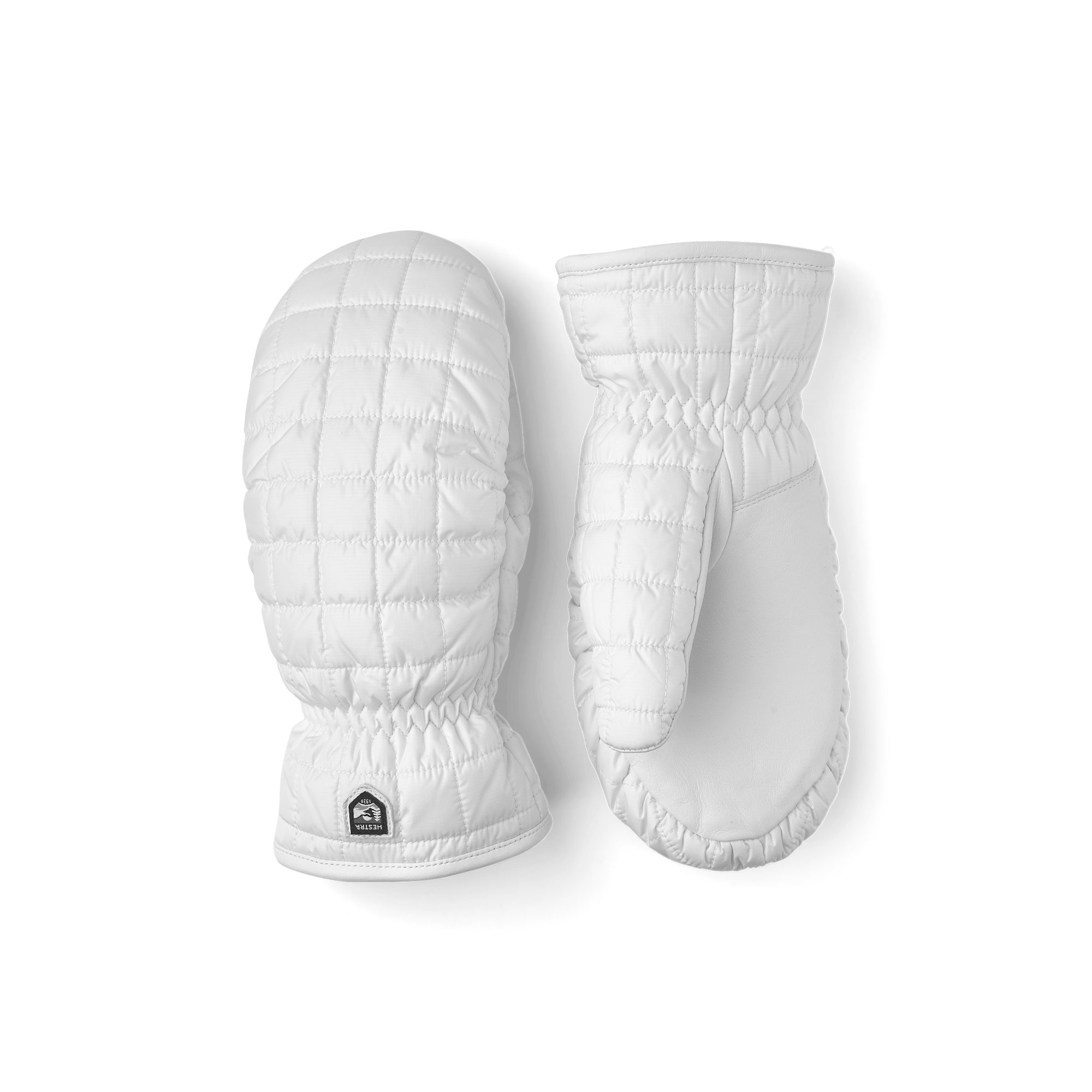 Vit tumhandske med lammnappa i innerhanden
 (1 av 5)