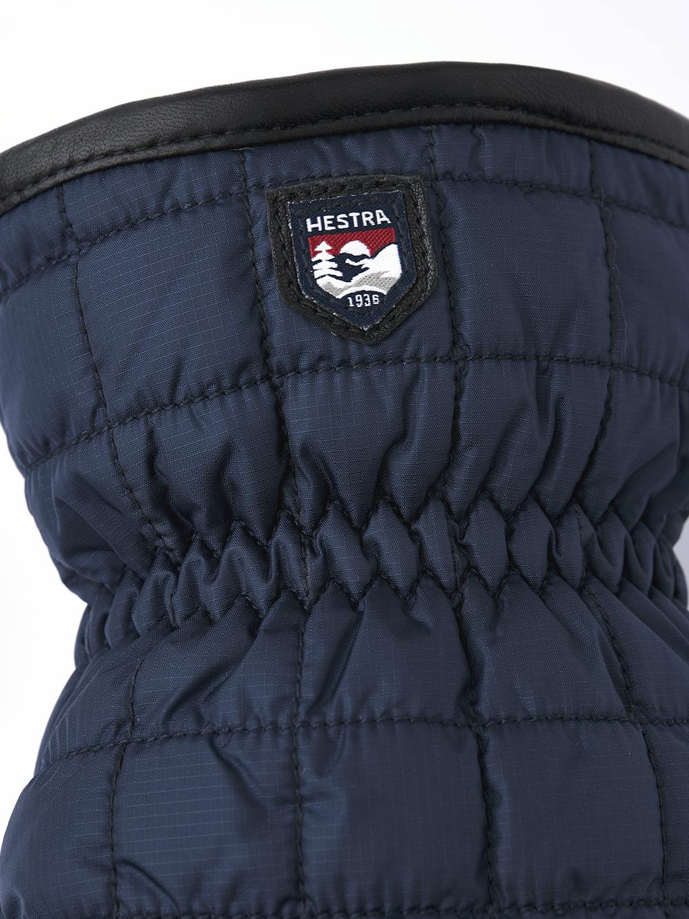 Dunkelblauer Fausthandschuh mit schwarzem Haarschafleder an der Innenhand (3 oder 6)