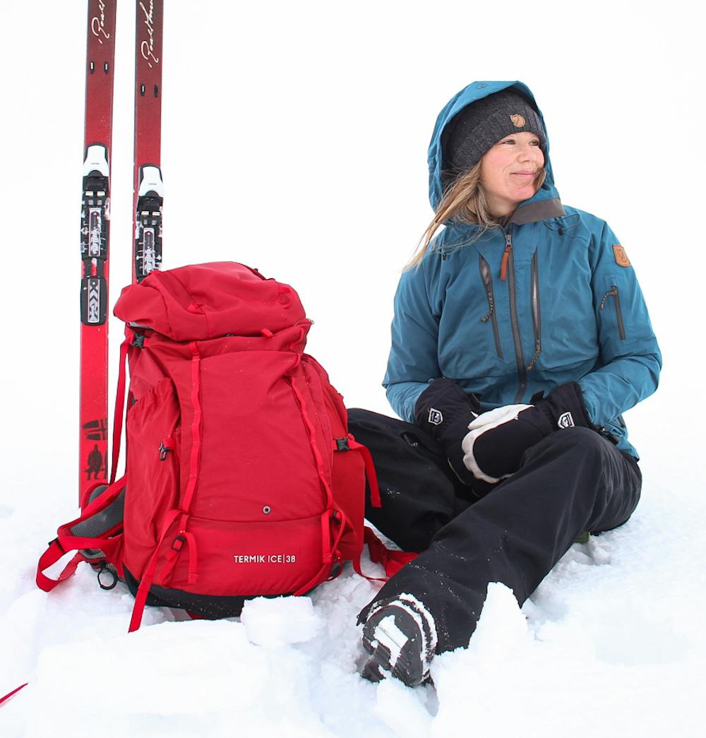 Schwarzer Fausthandschuh mit weißem Ziegenleder an der Innenhand und verstellbarem Handgelenkverschluss (9 oder 10)