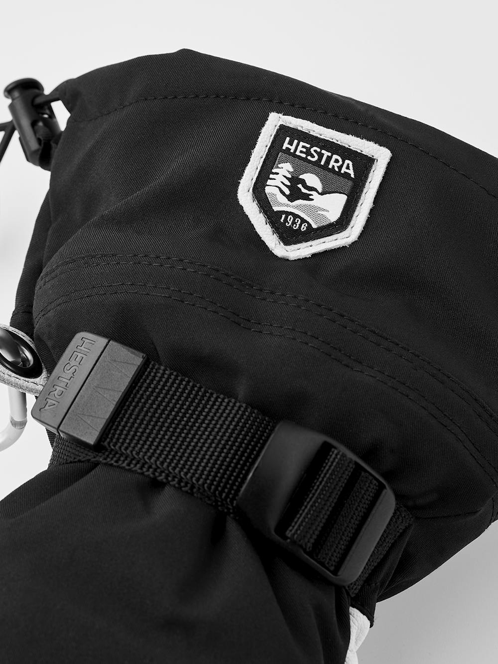 Schwarzer Fausthandschuh mit weißem Ziegenleder an der Innenhand und verstellbarem Handgelenkverschluss (6 oder 10)