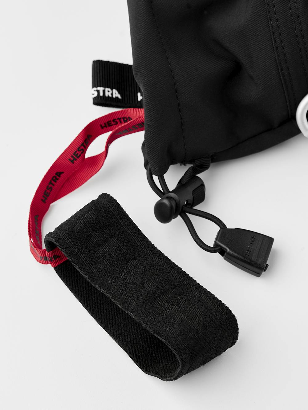 Schwarzer Fausthandschuh mit weißem Ziegenleder an der Innenhand und verstellbarem Handgelenkverschluss (8 oder 10)