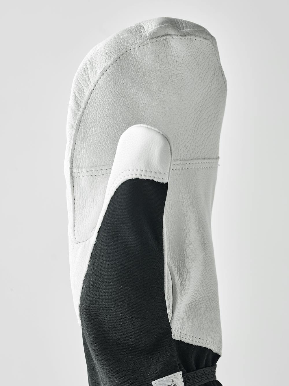 Schwarz-weißer Fausthandschuh mit weißem Ziegenleder an der Innenhand  (2 oder 6)