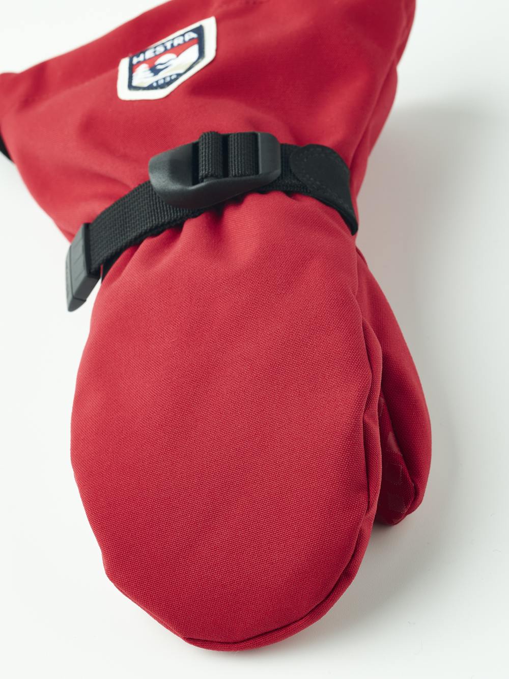 Roter Fausthandschuh aus Stoff mit verstellbarem Handgelenkverschluss (3 oder 7)