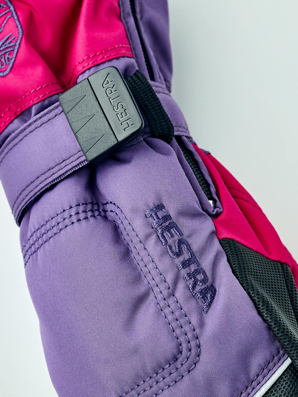 Purple and pink fabric mitten with black palm and wrist adjustment (3 of 4)