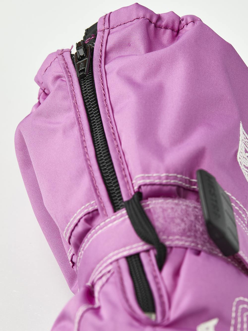 Rosa Fausthandschuh aus Stoff mit schwarzer Innenhand und verstellbarem Handgelenkverschluss (5 oder 5)