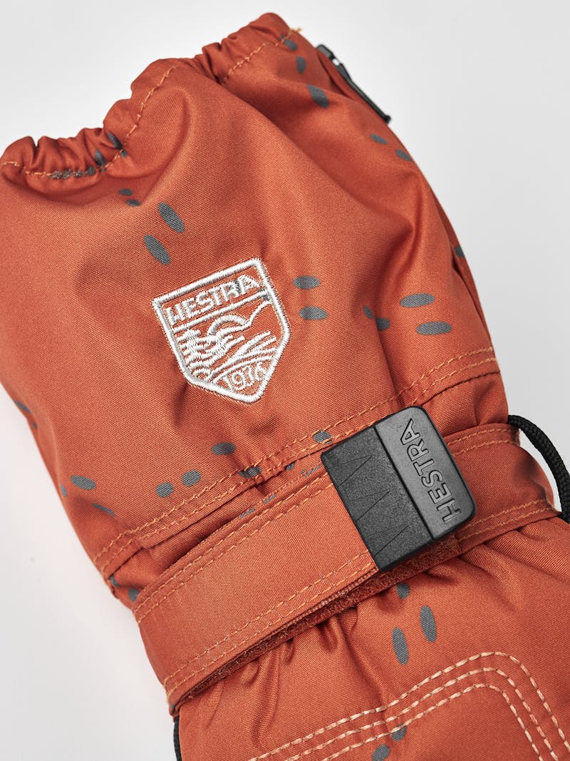 Orange print fabric mitten design with black palm and wrist adjustment (4 of 5)