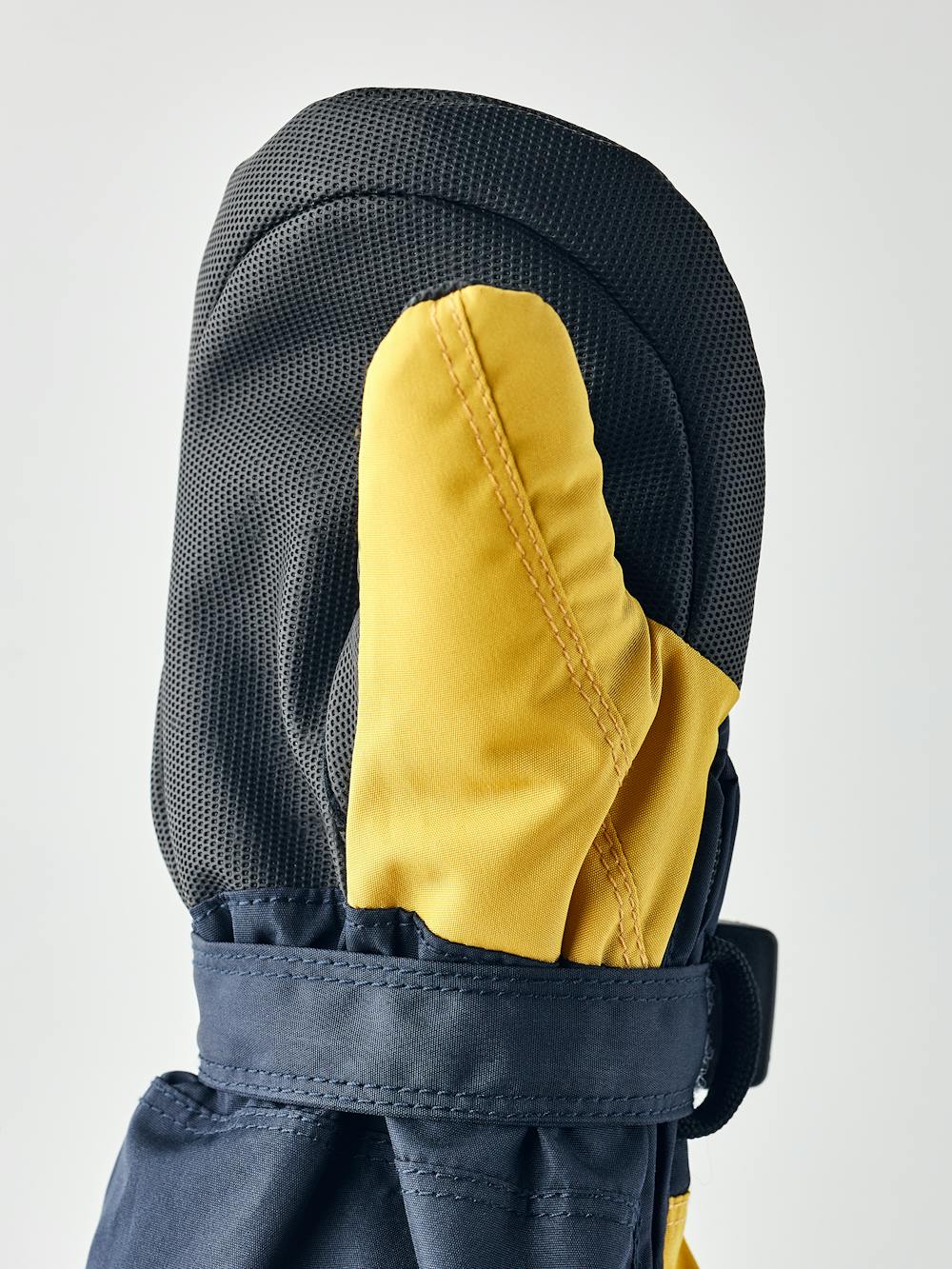 Dark blue and yellow fabric mitten with black palm and wrist adjustment (2 of 4)