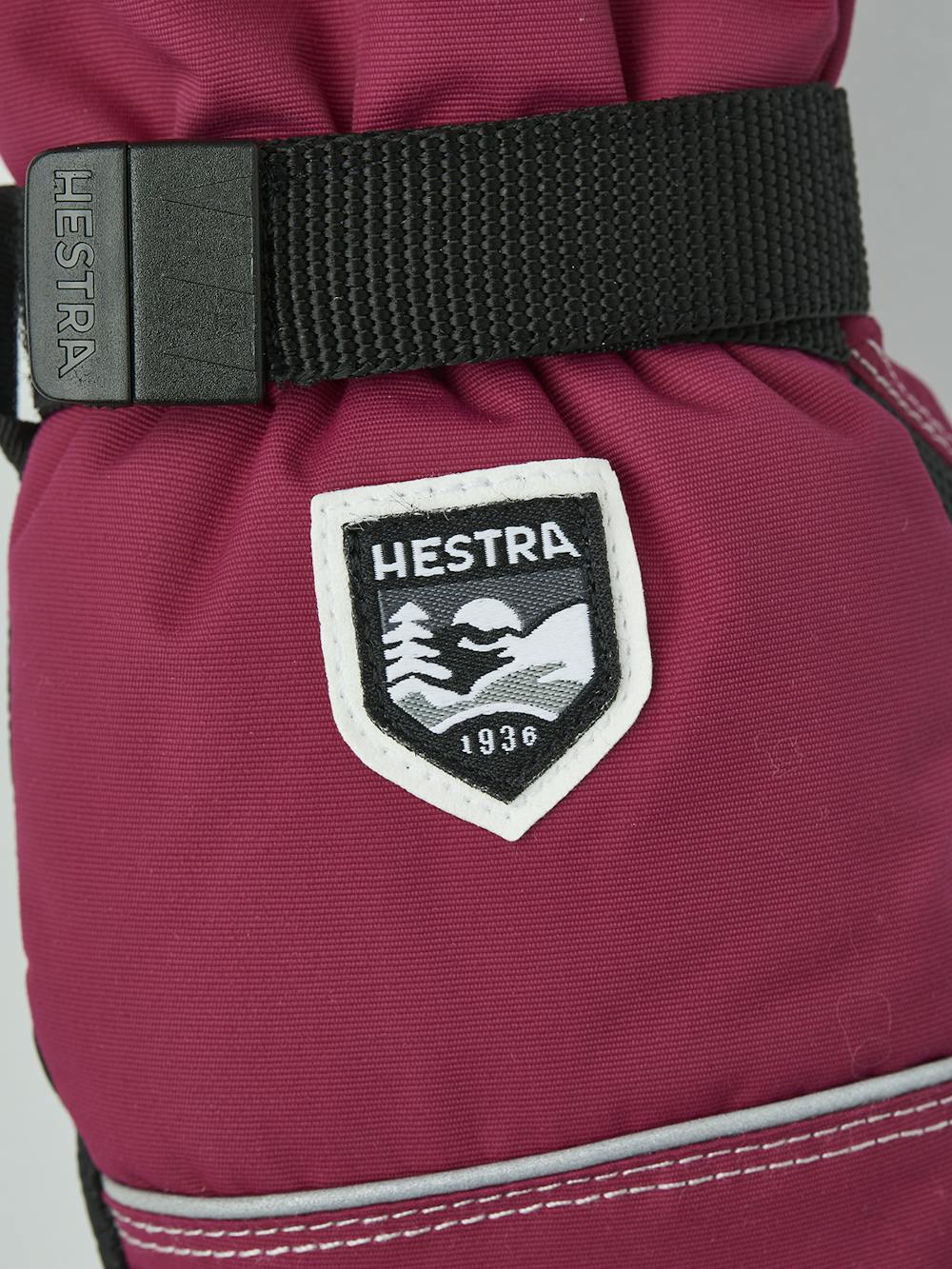 Pinker Fausthandschuh aus Stoff mit schwarzer Innenhand und verstellbarem Handgelenkverschluss (2 oder 5)