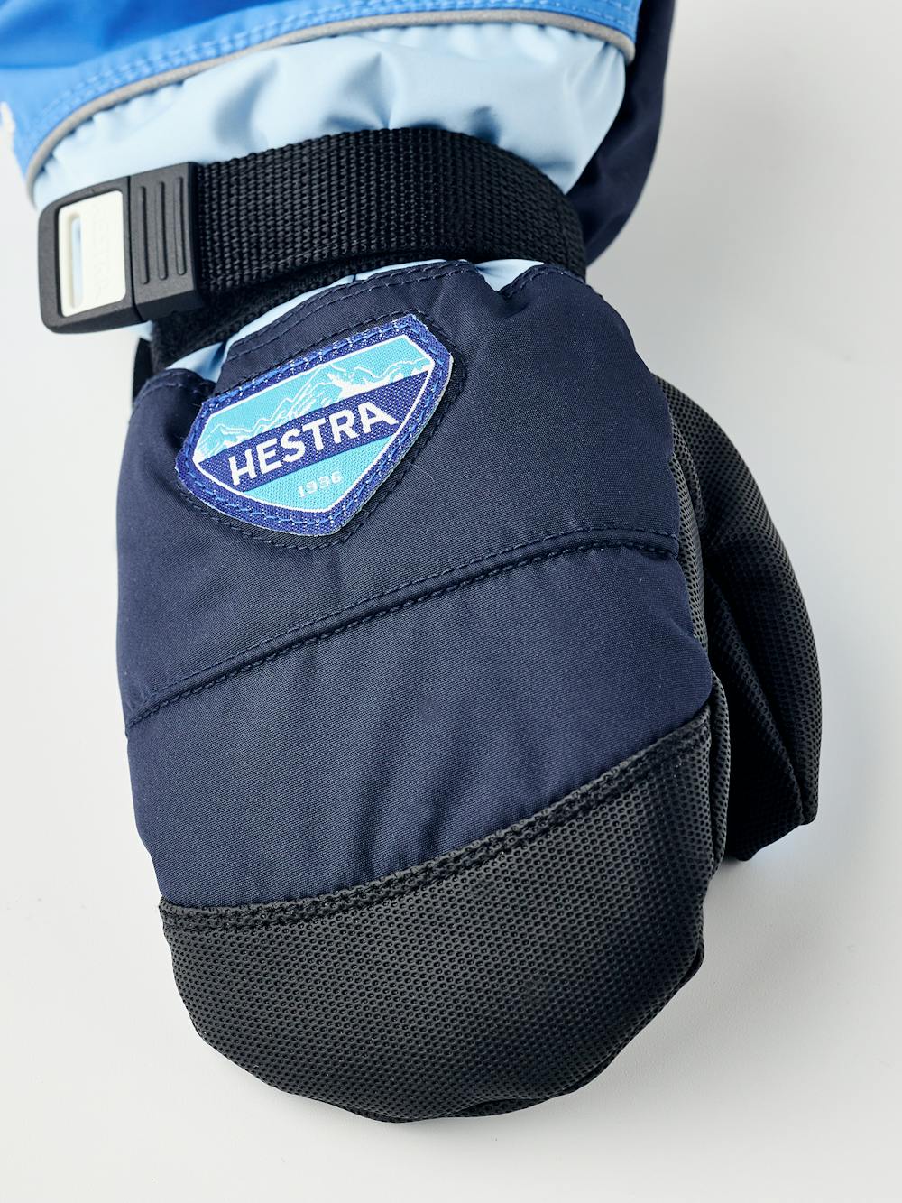 Blue fabric mitten with black synthetic palm and wrist adjustment (3 of 5)