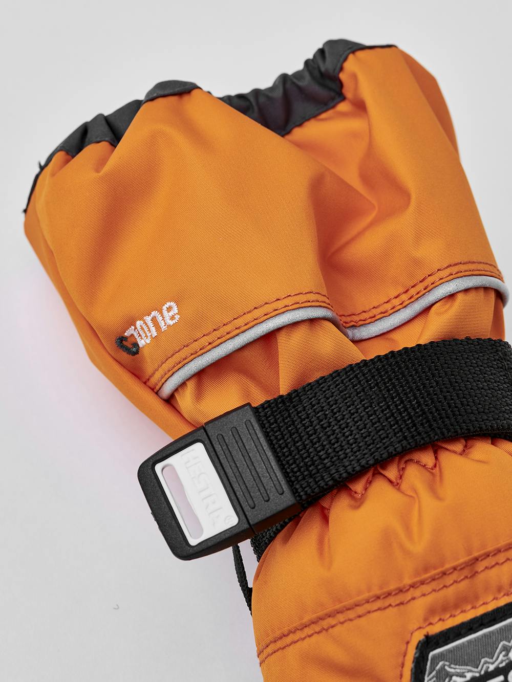 Orange fabric mitten with black synthetic palm and wrist adjustment (4 of 5)