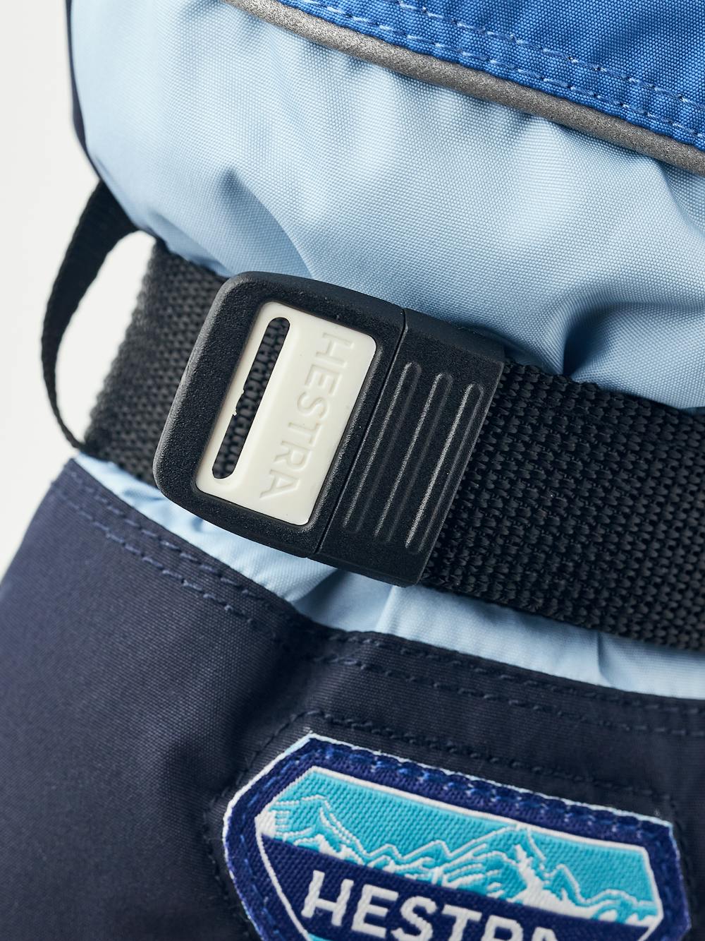 Blue fabric mitten with black synthetic palm and wrist adjustment  (5 of 5)