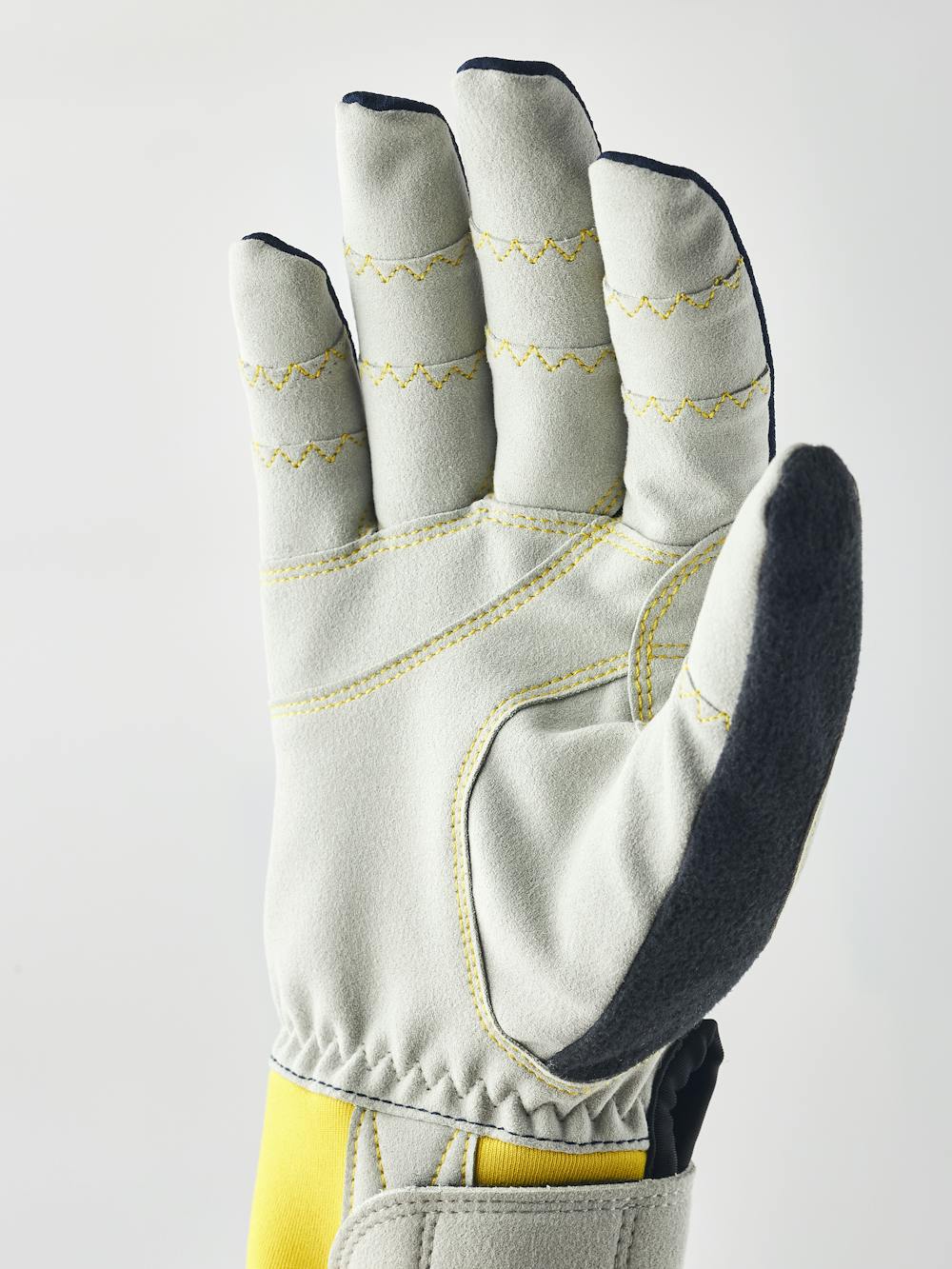 Mörkblå skidskyttehandske i tyg med grå innerhand i syntetisk mocka
 (2 av 6)