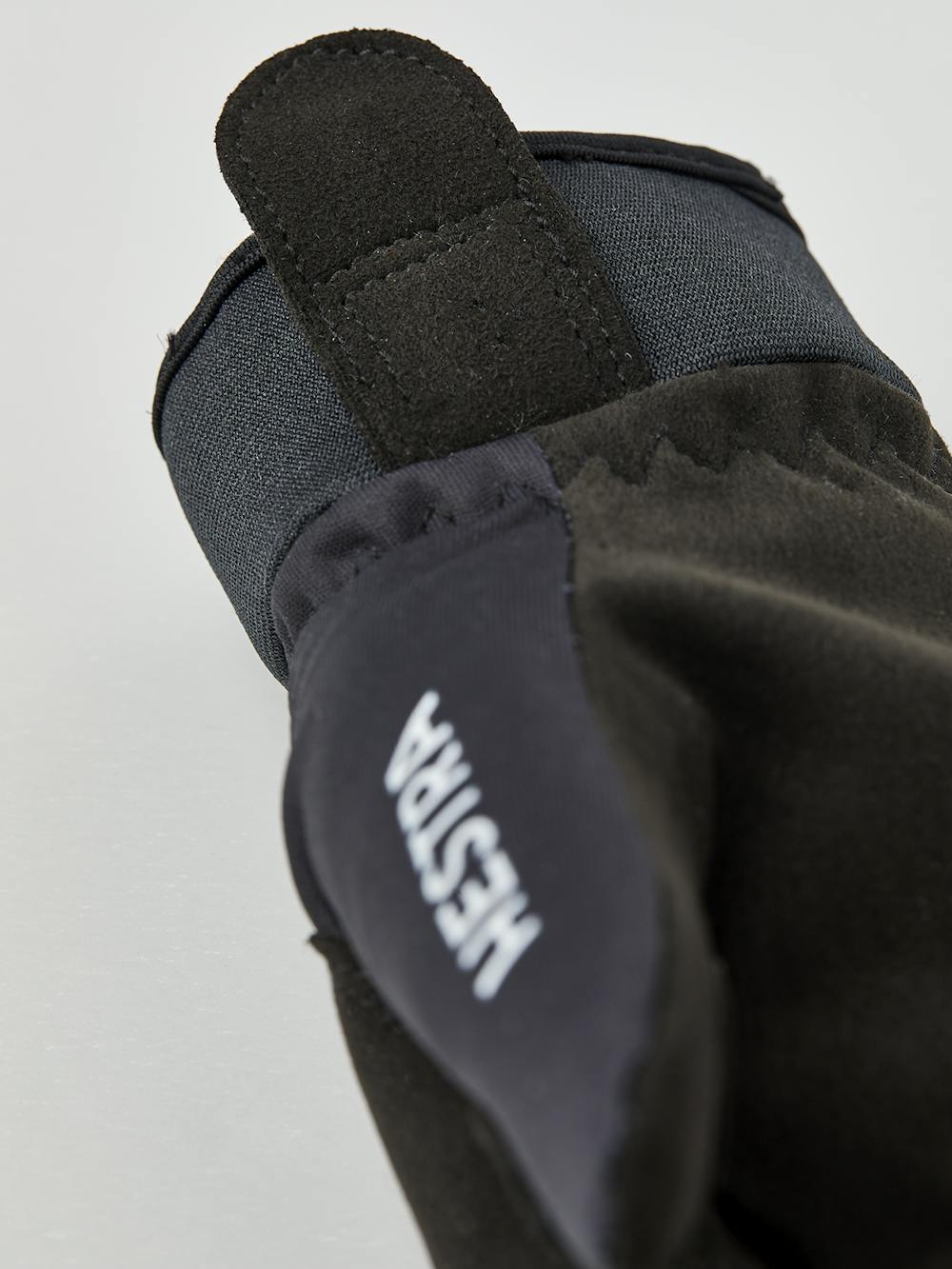 Black and white fabric cross-country ski glove with black synthetic suede palm (4 of 5)