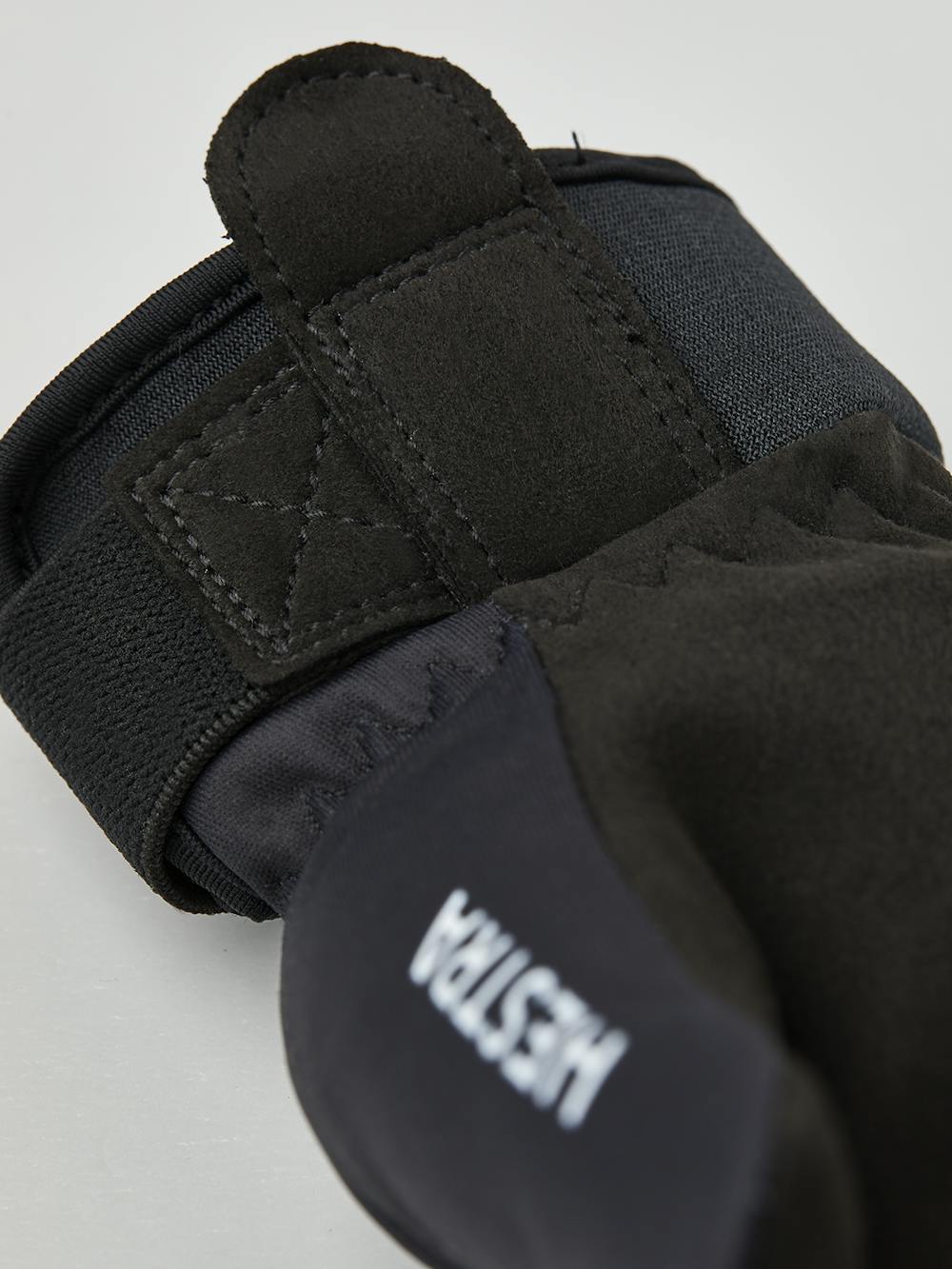 Black and white fabric mitten with black synthetic suede palm  (5 of 5)