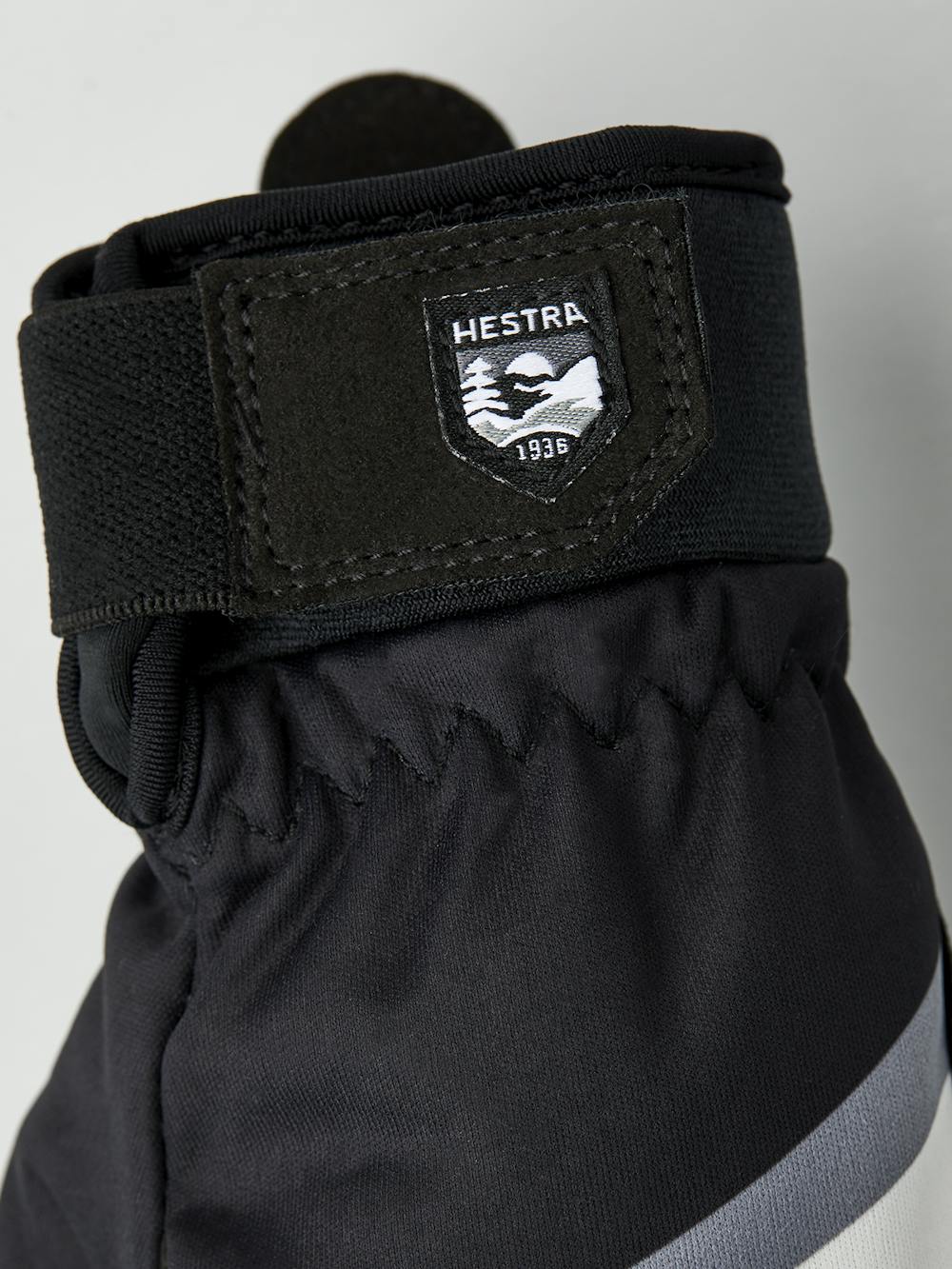 Black and white fabric mitten with black synthetic suede palm (3 of 5)