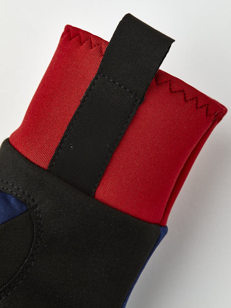 Dark blue and red fabric cross-country ski glove with black synthetic suede palm (5 of 6)