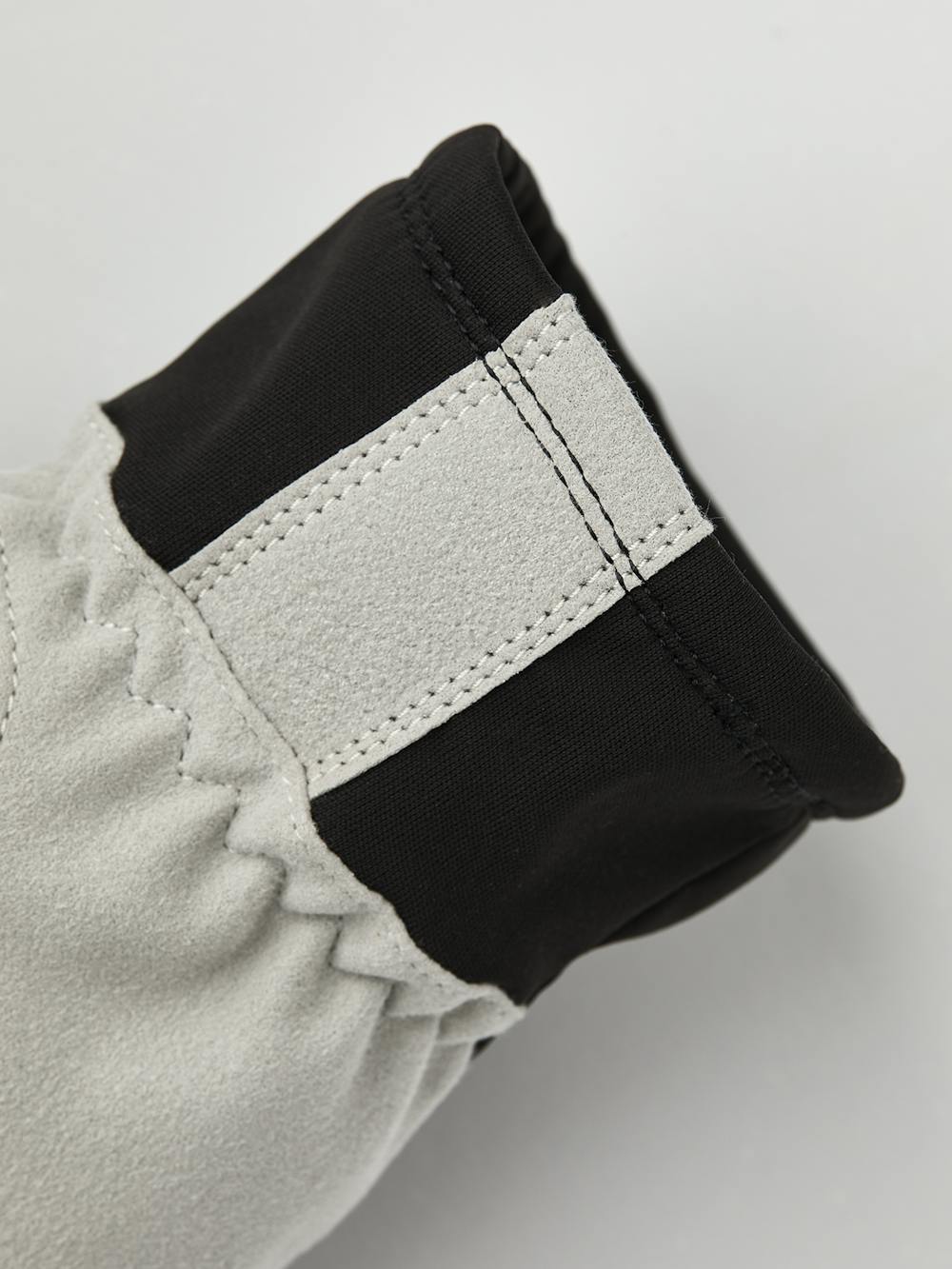 Black fabric cross-country ski glove with gray synthetic suede palm (2 of 4)
