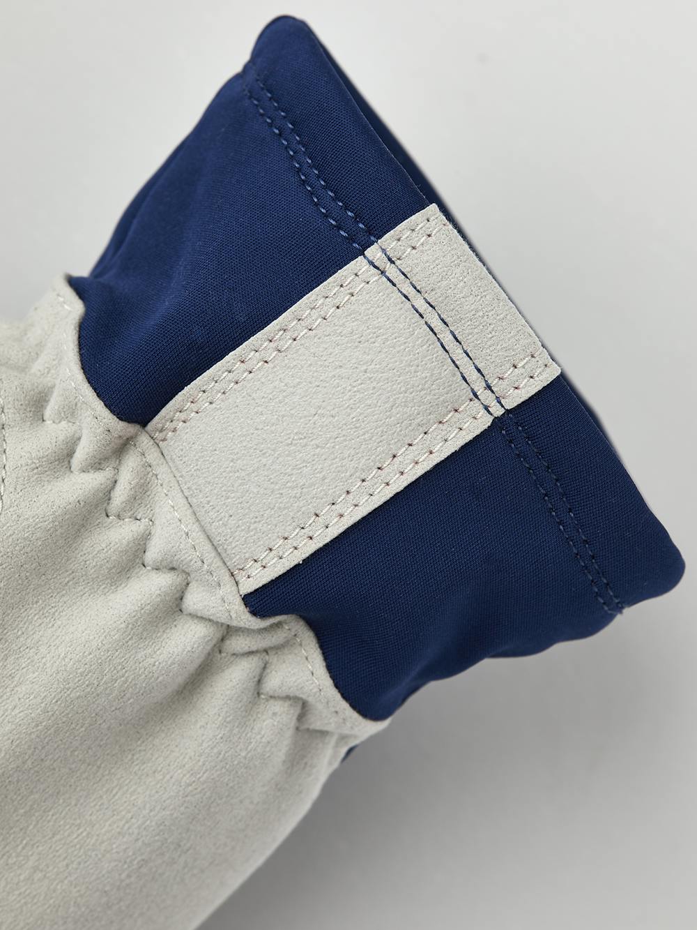 Dark blue fabric cross-country ski glove with gray synthetic suede palm (2 of 5)