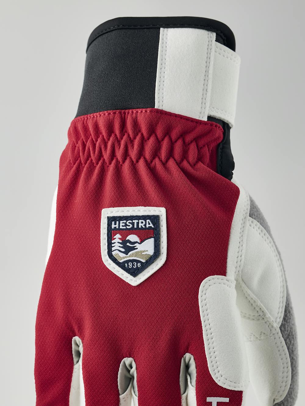Red fabric cross-country ski glove with white synthetic suede palm (5 of 7)