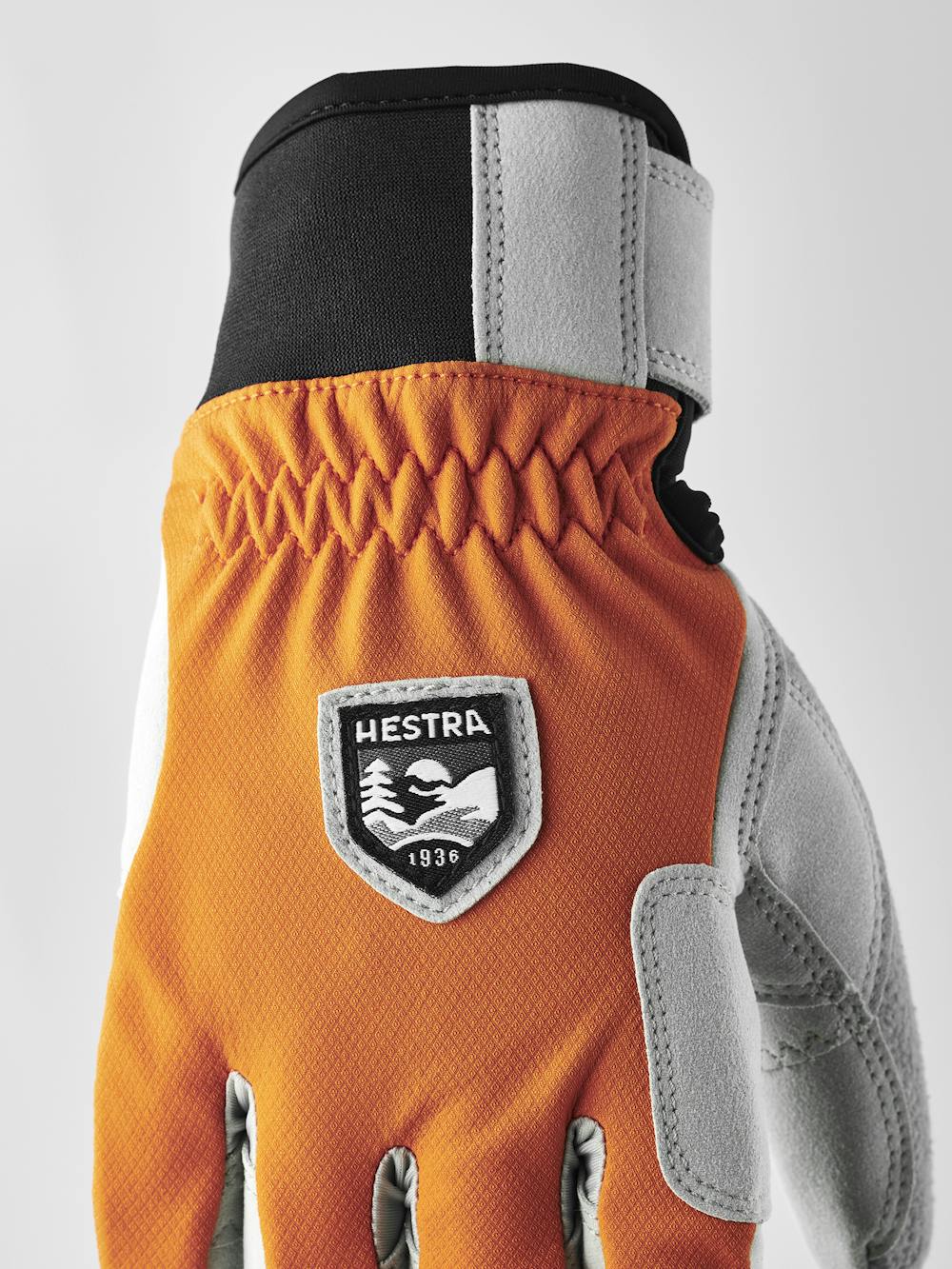 Orange fabric cross-country ski glove with gray synthetic suede palm (7 of 8)