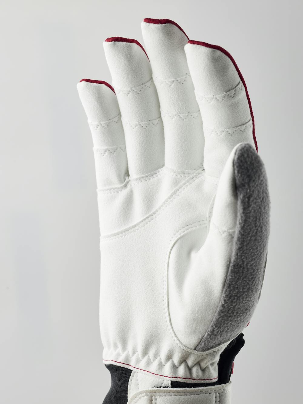 Red fabric cross-country ski glove with white synthetic suede palm (2 of 7)