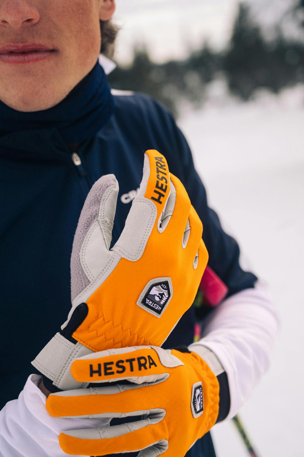 Orange fabric cross-country ski glove with gray synthetic suede palm (8 of 8)