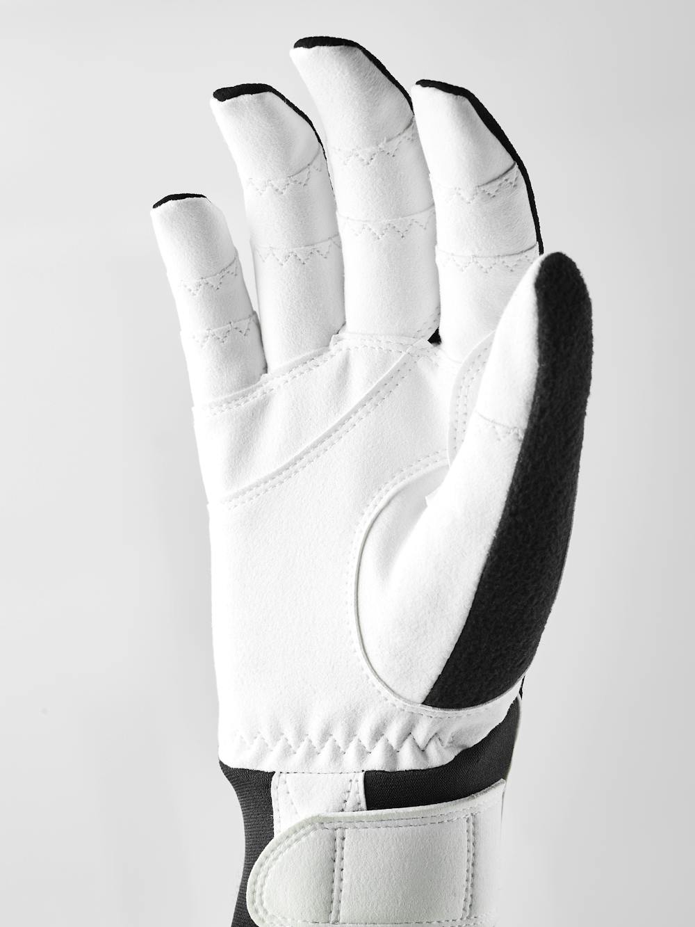 Black fabric cross-country ski glove with white synthetic suede palm (2 of 5)