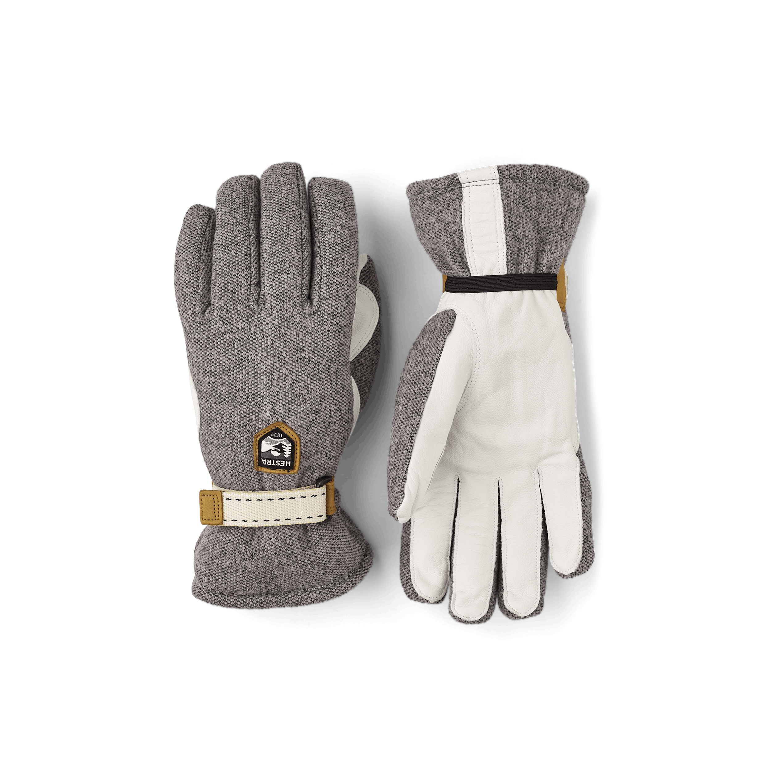 Grå längdskidhandske med vitt getskinn i innerhanden och handledsjustering
(1 av 5)